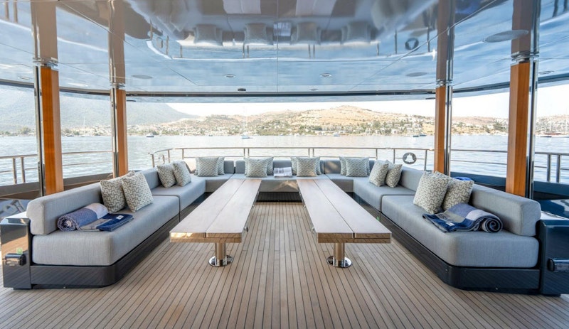 cockpit seating area covered by flybridge on mondomarine