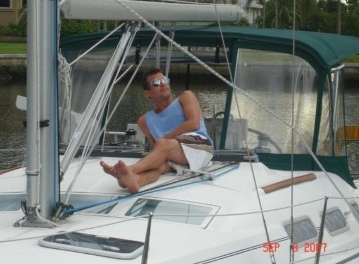 greg enjoying time on a sailboat