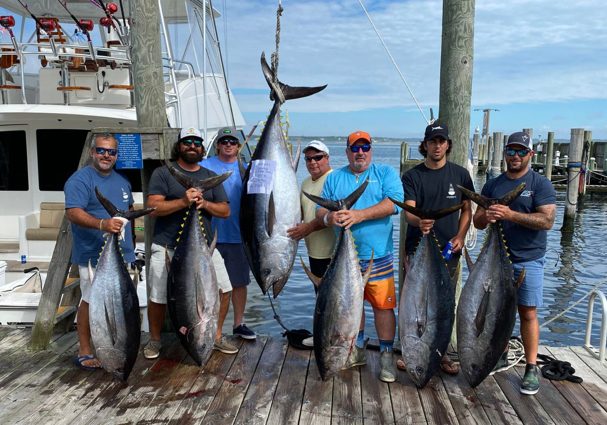 yacht broker fishing with clients