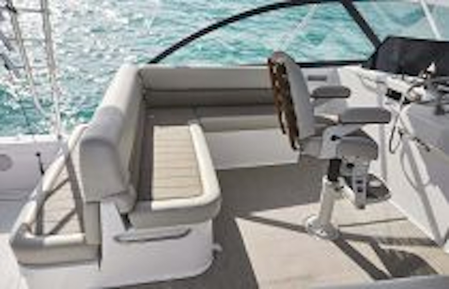 photo of bench seating behind helm on cabo 41
